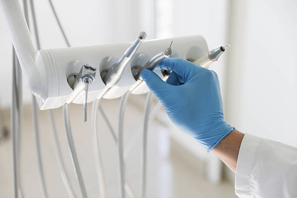 Professional Emergency Dentist technician working in Stanton, MI